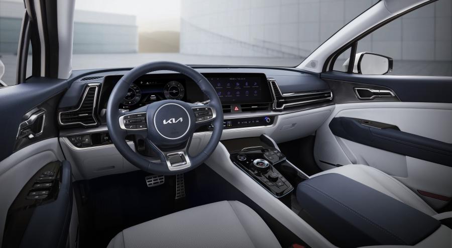 Интерьер Kia Sportage 2021 года  (KR) (фото 2 из 9)