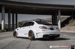 2015 BMW M5 by Prior Design on Savini Wheels
