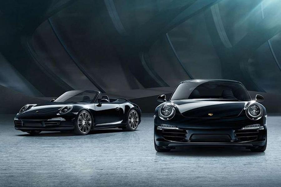 Спорткары Porsche 911 и Boxster перекрасились в черный