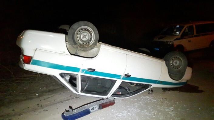 Полицейский автомобиль перевернулся после ДТП в Алматы