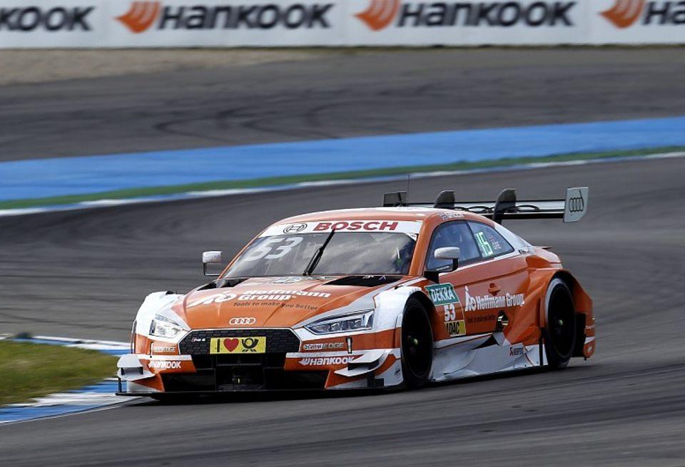 Джейми Грин выиграл воскресную гонку DTM, несмотря на штраф