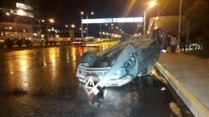 Автомобиль перевернулся из-за мокрого асфальта в Алматы