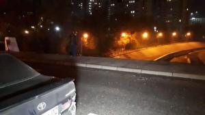 Автомобиль рухнул с моста в реку после ДТП в Алматы