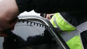 Московского водителя арестовали на сутки за отказ снять тонировку