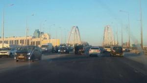 Полицейский автомобиль попал в ДТП на мосту в Астане 