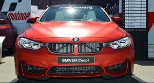 BMW представила специальное M4 Coupe, которое будет подарено чемпиону MotoGP 2014